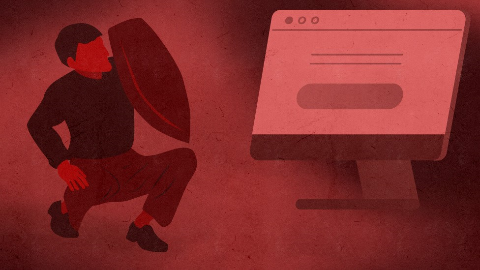 Čovek koji se štitom brani od računara