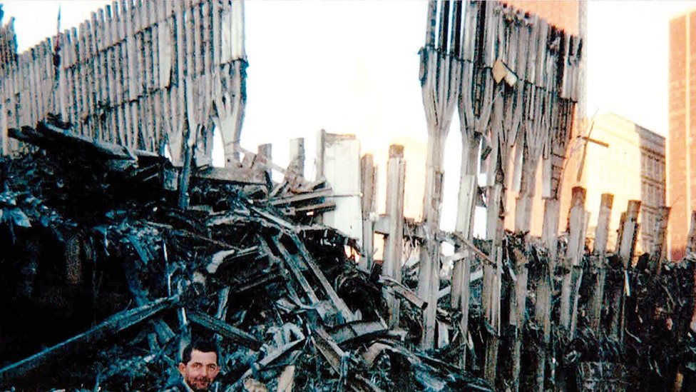 Picture of Rory by 9/11 wreckage, where he volunteered in 2001