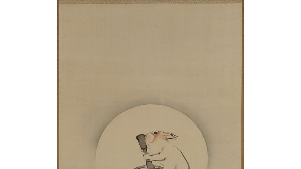 A mystical hare inhabits the moon in Japanese folklore, as shown in Rabbit Pounding the Elixir of Life Under the Moon by Mori Ippo, 1867