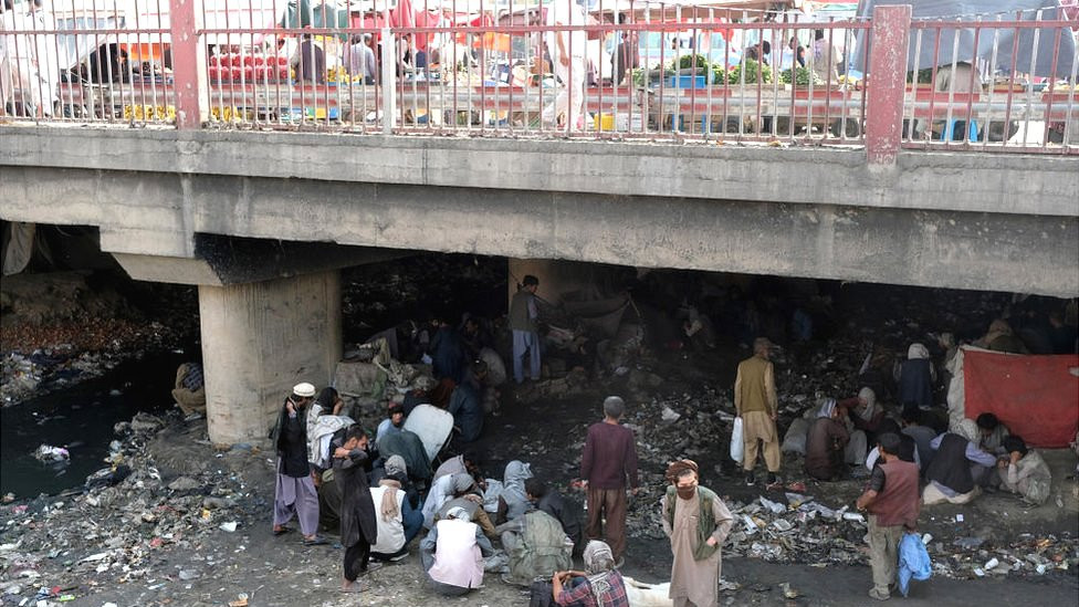 Hundreds of mainly heroin users sit in squalid conditions at Pul-e-Sukhta, under a bridge in western Kabul, Afghanistan, 20 September 20, 2021
