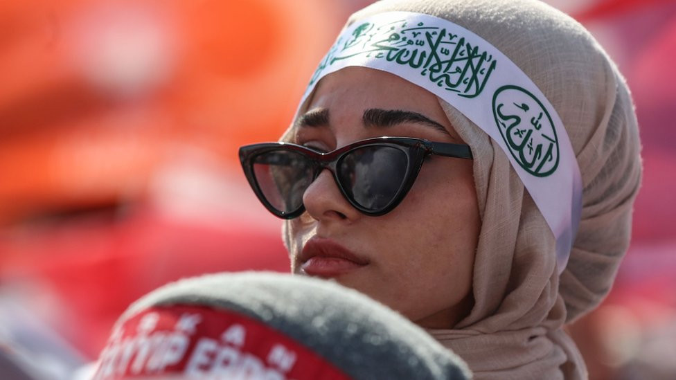 A supporter of Turkish President Recep Tayyip Erdogan looks on during election campaign rally in Istanbul, Turkey, 07 May 2023.