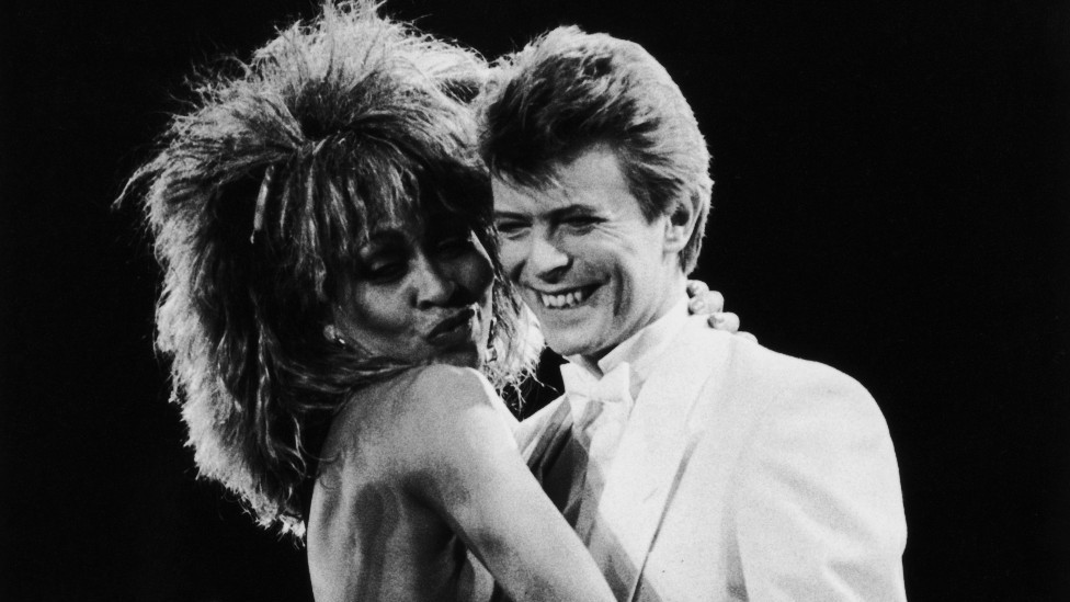 Singers David Bowie and Tina Turner perform on stage at the NEC Birmingham.
