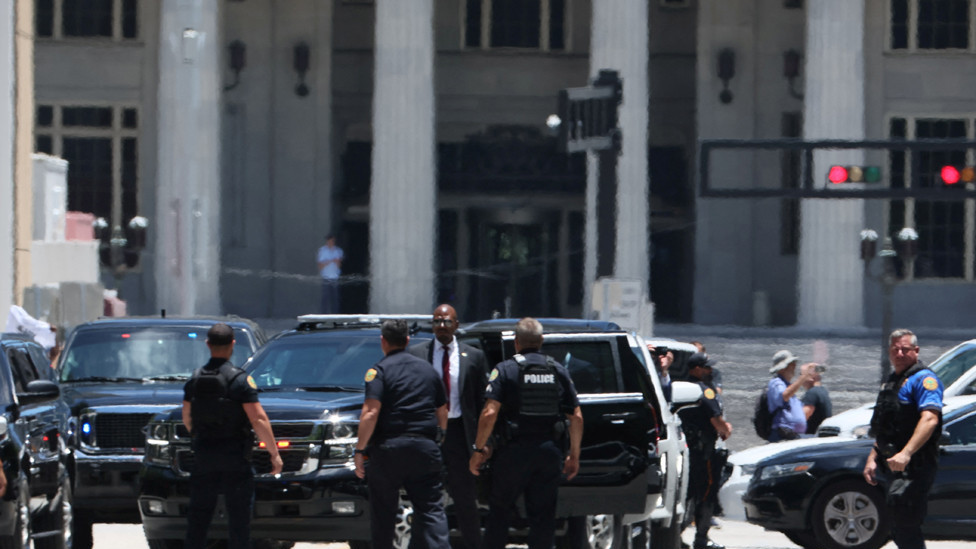 Law enforcement officers operate as the motorcade former U.S. President Donald Trump arrives at the Wilkie D. Ferguson Jr. United States Courthouse, to appear at his arraignment on classified document charges, in Miami, Florida