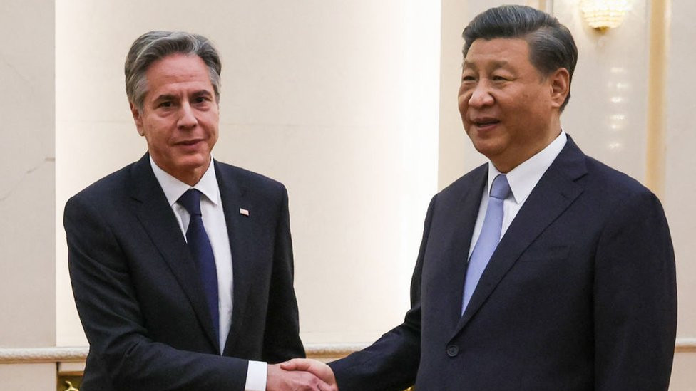 US Secretary of State Antony Blinken (L) shakes hands with China's President Xi Jinping at the Great Hall of the People in Beijing on June 19, 2023.