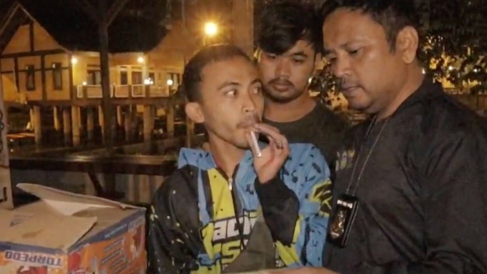 Police in Indonesia detain Asep Yadi Nurul Hikmah, who was among the most brutal torturers.