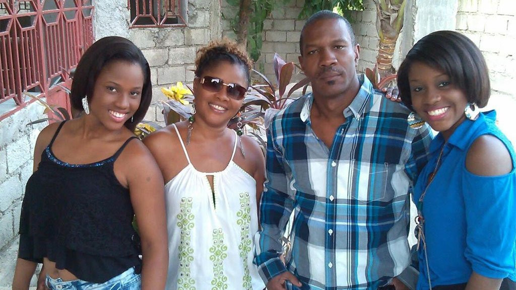 Jean Simson Desanclos with his wife and two daughters