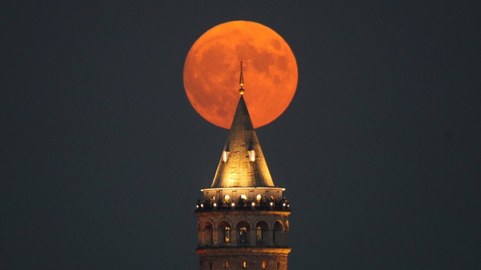 The blue supermoon is seen over the Galata Tower in Istanbul, Turkey. Photo: 30 August 2023