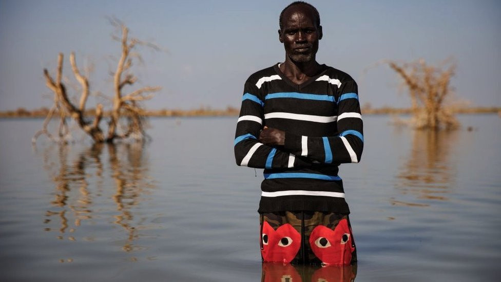 Man standing in flood