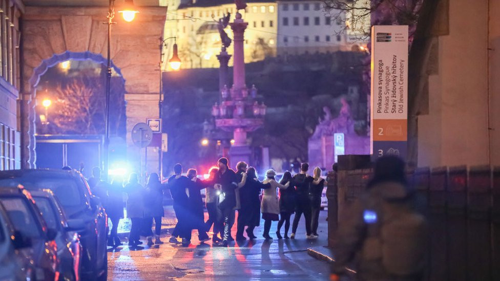 Students of Charles University are being evacuated by police at the location of the shooting on December 21, 2023 in Prague, Czech Republic.