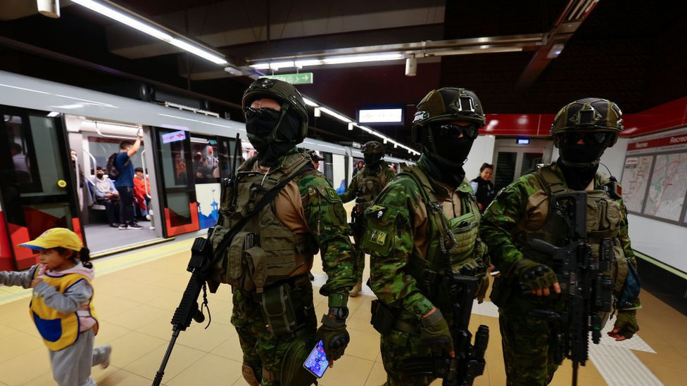 Military officers guard a metro station on January 09, 2024 in Quito, Ecuador. President Noboa declared on Monday 8th a 60-day state of emergency and curfew