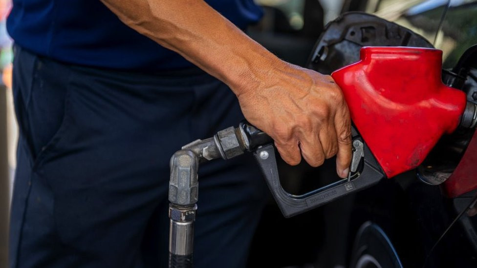 Man filling up with gas