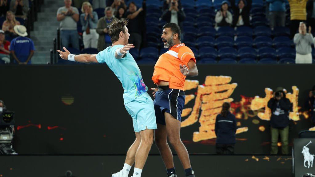 Australia's Matthew Ebden and India's Rohan Bopanna celebrate winning the 2024 Australian Open men's doubles title