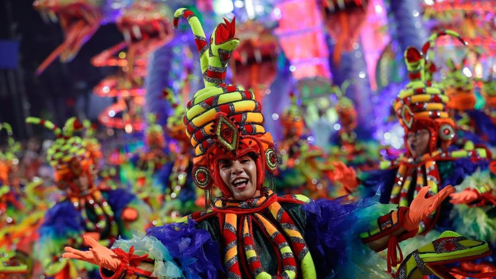 Members of the Unidos do Viradouro samba school parade during the second day of the Rio de Janeiro carnival at the Sambadrome in Rio de Janeiro, Brazil, 13 February 2024.