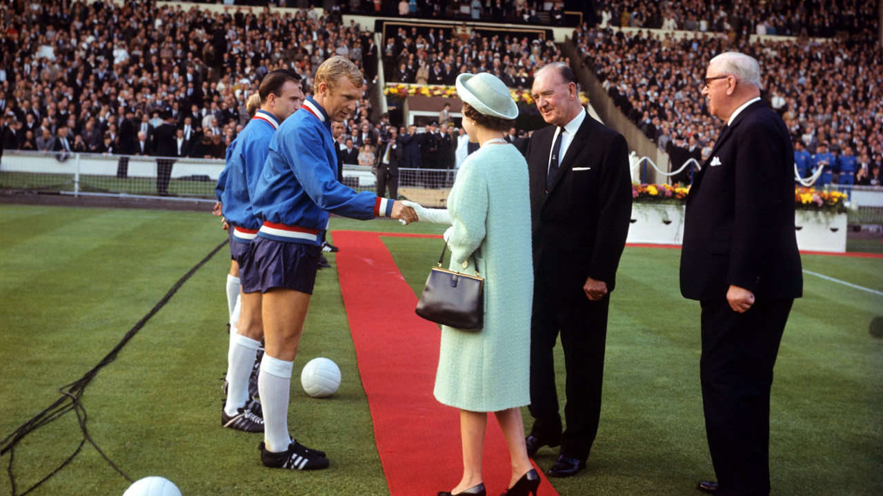 H.M. Queen meets England captain Bobby Moore before kick off at FIFA World Cup England 1966 - Opening Match - Group One - England v Uruguay - Wembley Stadium