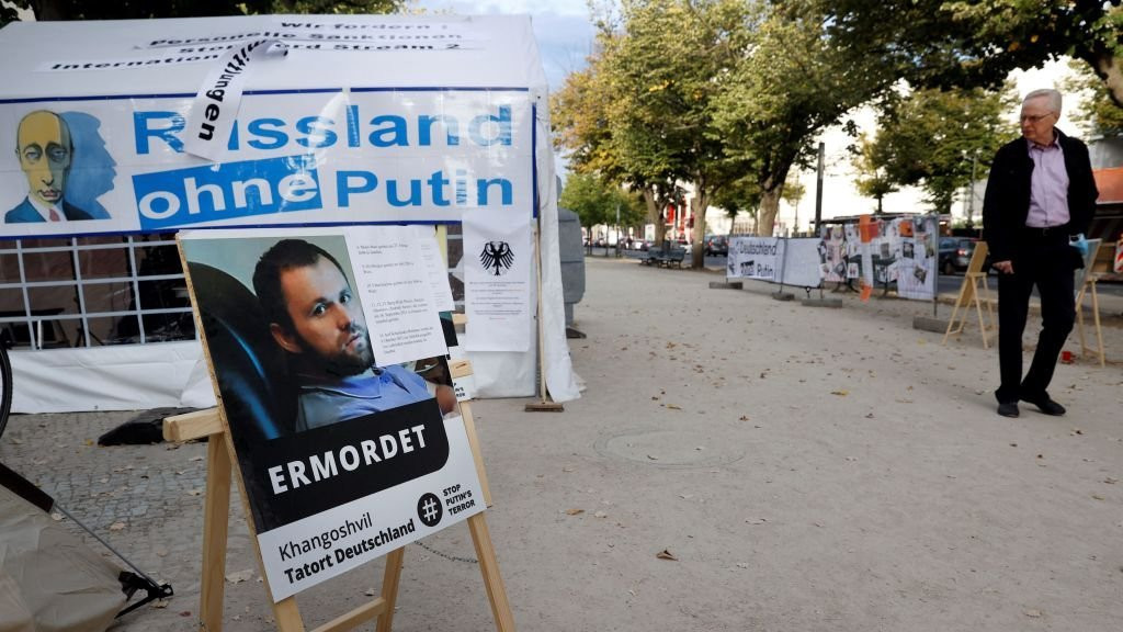 A poster bearing a portrait of Georgian national Zelimahn Khangoshvili, who was shot dead by an alleged Russian operative in Berlin's Kleiner Tiergarten Park in August 2019