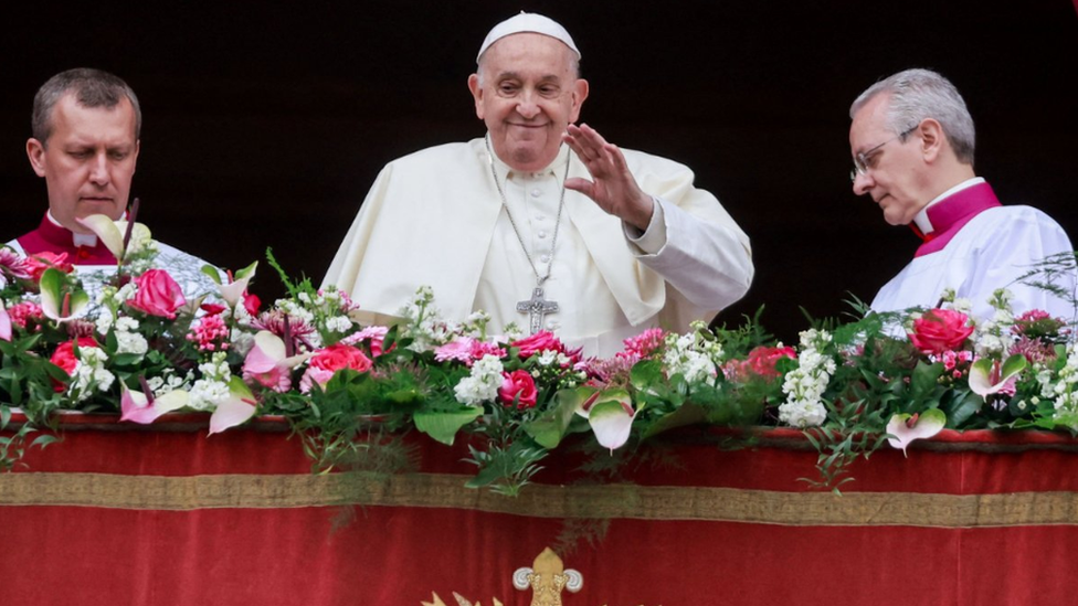 Tens of thousands of people gathered outside St Peter's Square during the Easter Mass in the Vatican on Sunday morning