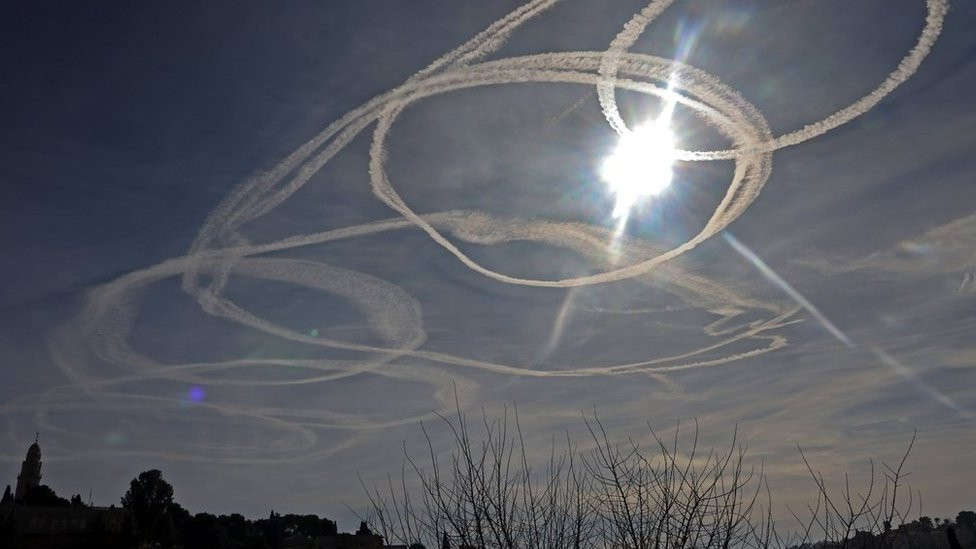 Aircraft vapour trails over Jerusalem in 2021 (file image)