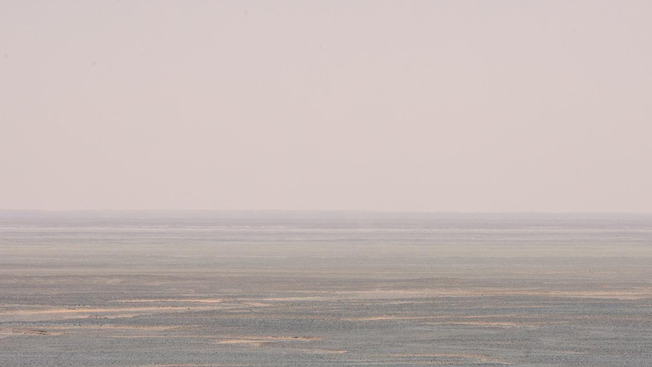 Russell Cook running in the Sahara Desert