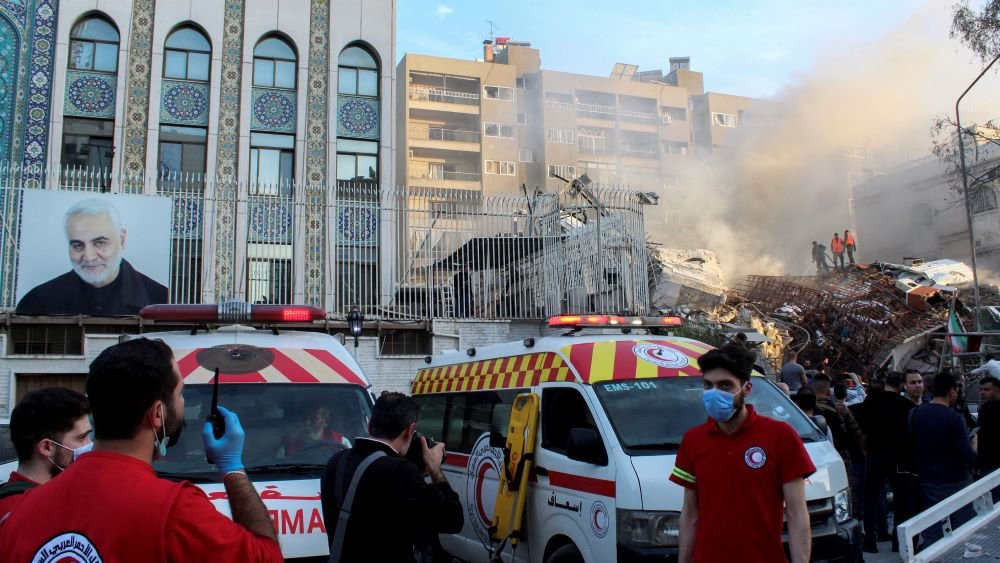 The rubble of a destroyed building lies next to Iran's consulate in Damascus on 1 April 2024