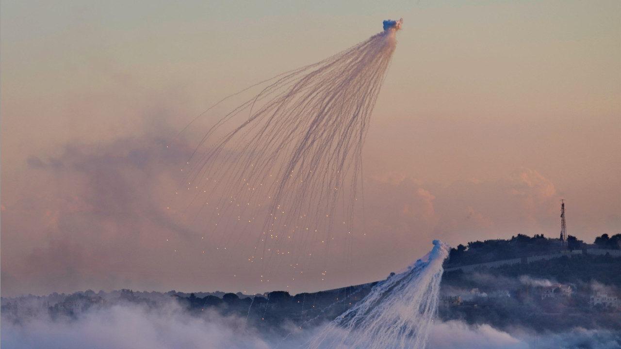 This image, taken on 16 October over Dhayra, shows the typical octopus shaped smoke cloud. It's tendrils still alight, as the toxic munitions fall towards the earth. Home to approximately 30 families, Dhayra is surrounded by grazing lands and olive groves