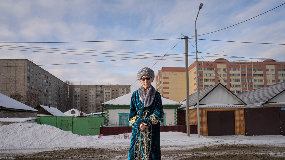 Portrait of a man in Kazakhstan wearing a traditional clothing