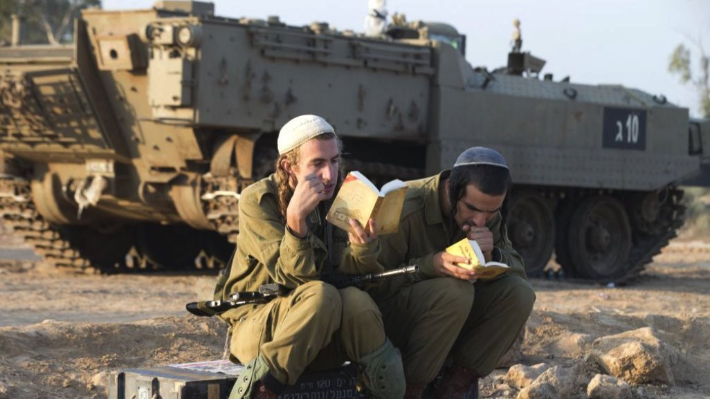 Two soldiers reading books