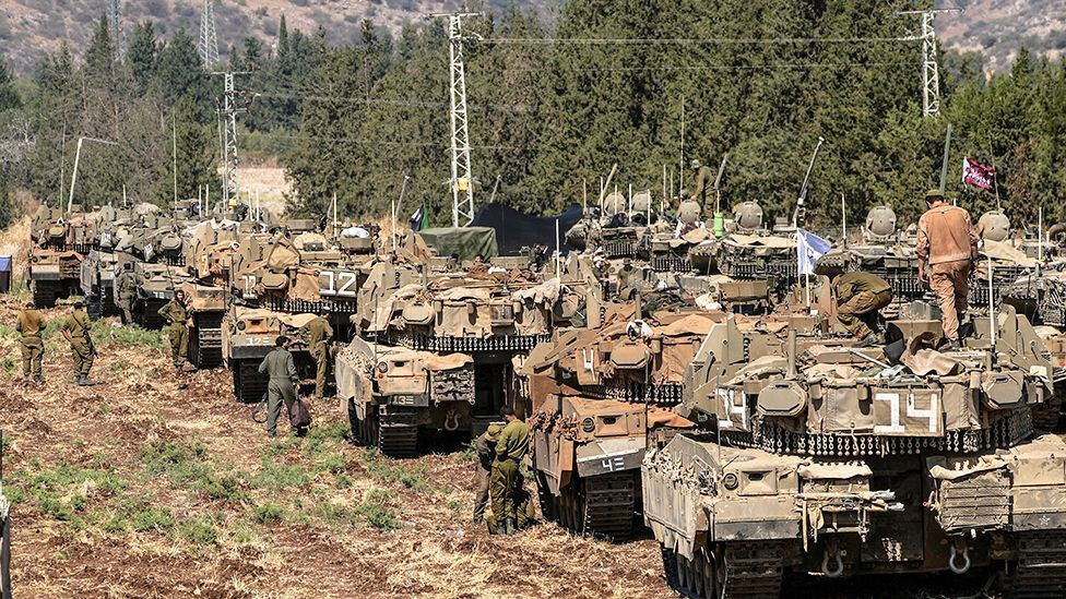 Israeli tanks at an undisclosed location in northern Israel last week