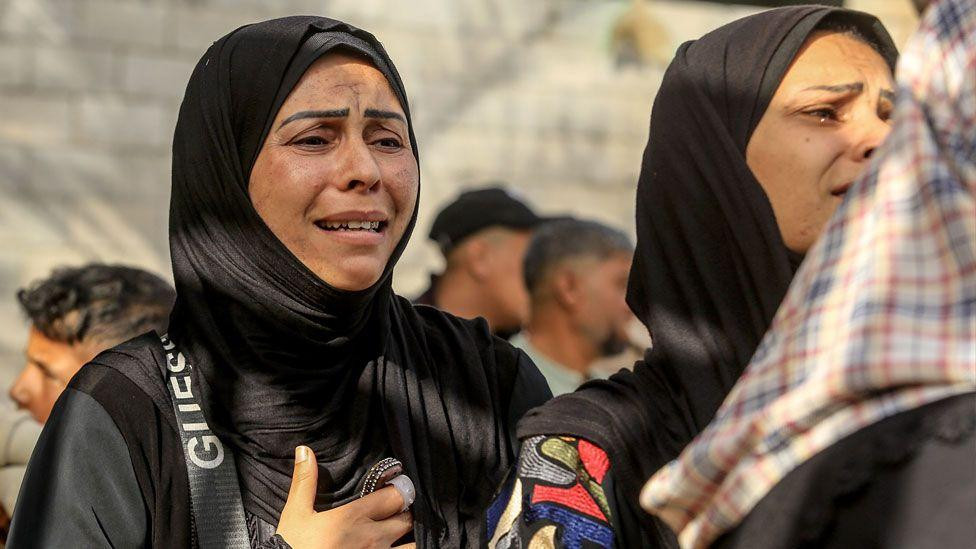 Relatives of Palestinians, who were killed in Israeli attacks, mourn at Nasser Hospital in Khan Yunis, Gaza on May 20, 2025.