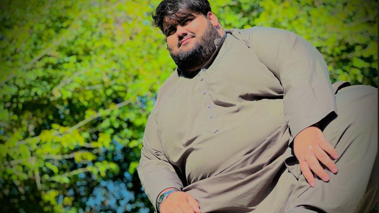  Qudratullah looking at the camera 