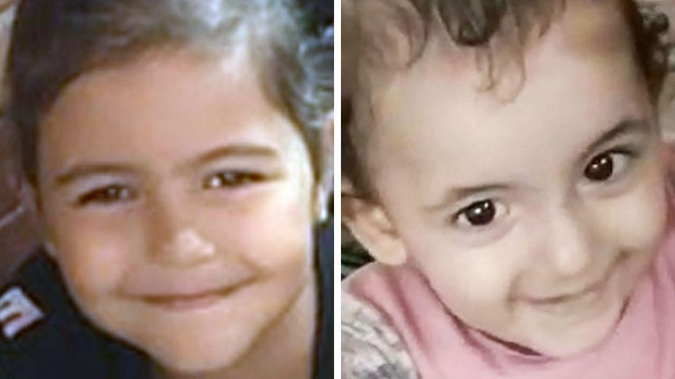 
                    A composite image of two young girls smiling at the camera. The girl on the right is a toddler and the girl on the left is a few years older. Both have dark hair. The tod