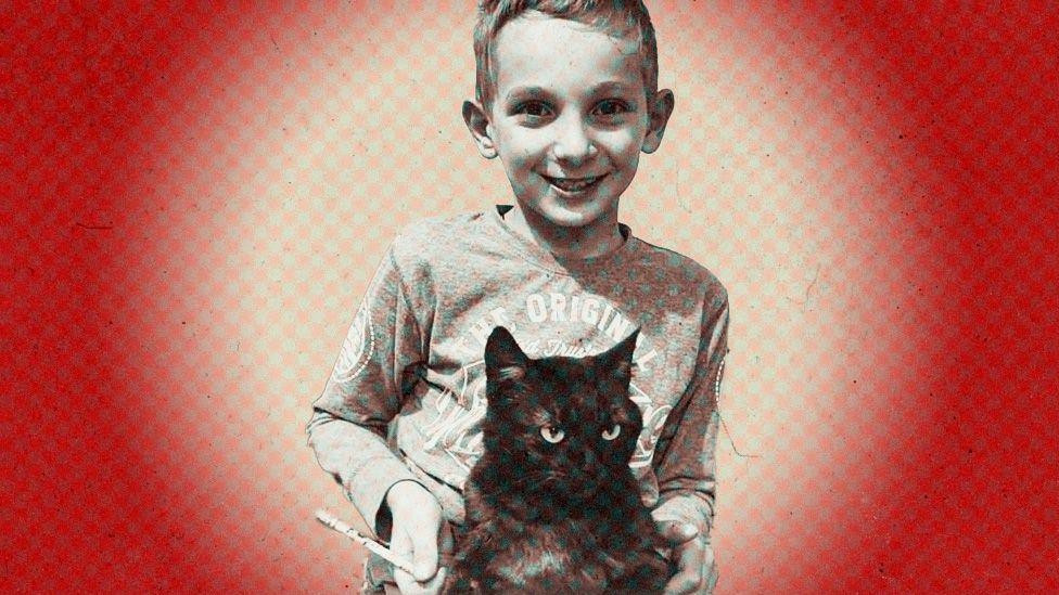 Miloš Grbić s mačkom