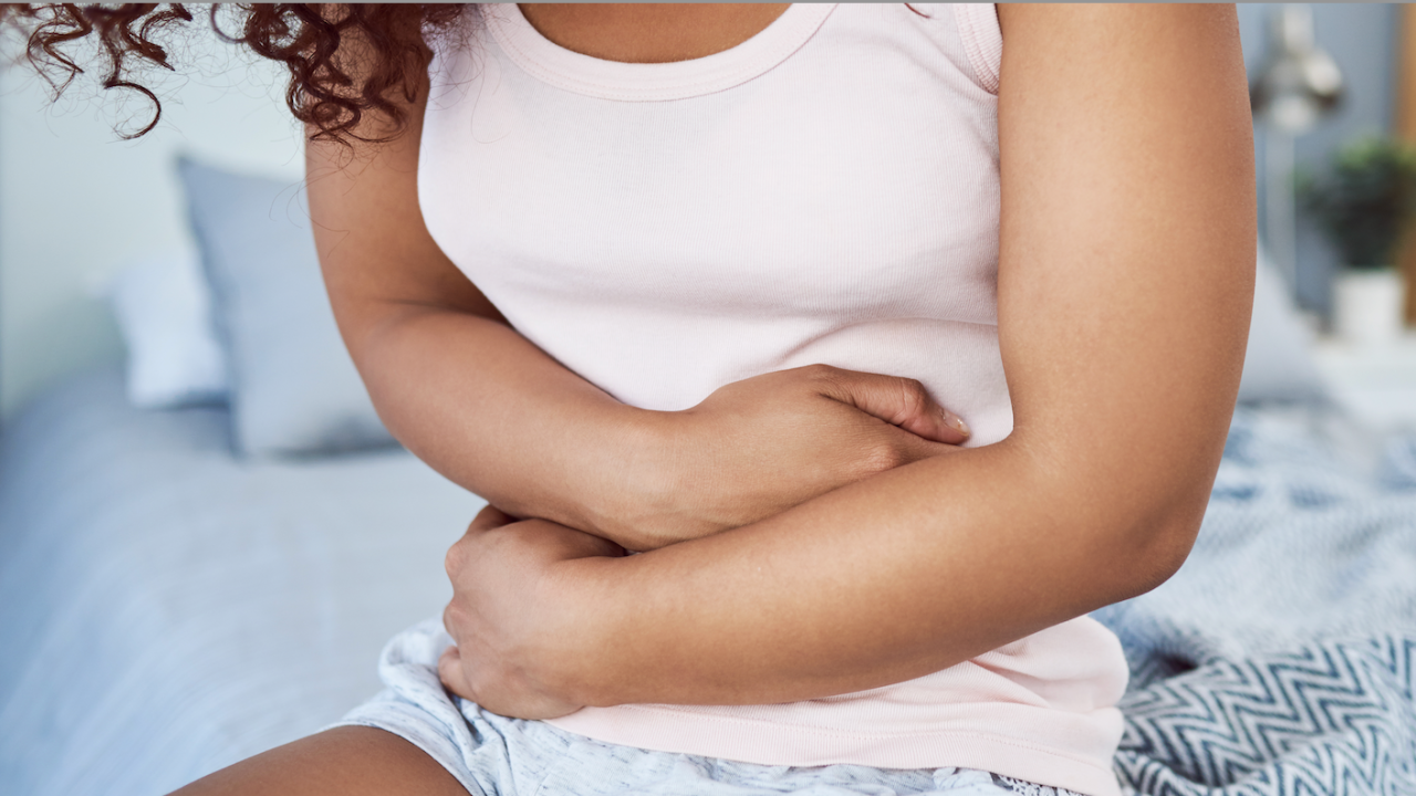 Woman holding her stomach