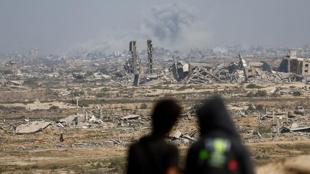 Image shows smoke rising during an Israeli military operation in Gaza City