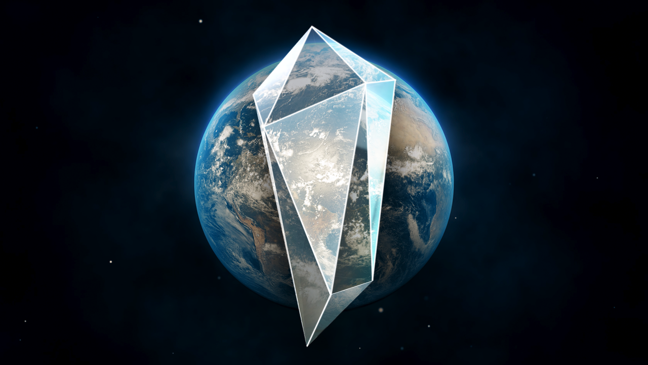 providni kristal postavljen preko slike planete Zemlje