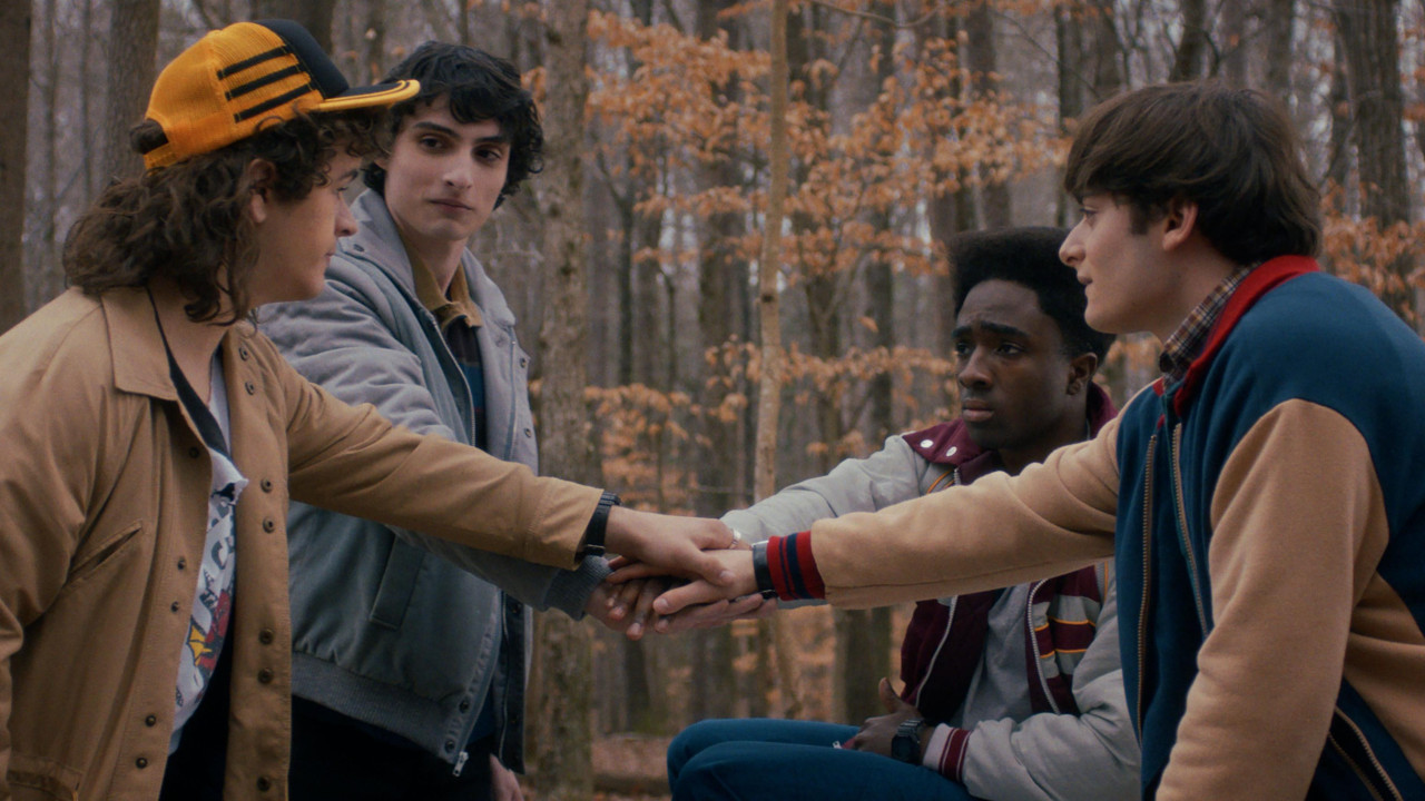 Gaten Matarazzo as Dustin Henderson, Finn Wolfhard as Mike Wheeler, Caleb McLaughlin as Lucas Sinclair, and Noah Schnapp as Will Byers