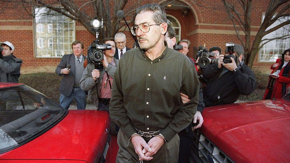  Former senior Central Intelligence Agency office Aldrich Hazen Ames is led from U.S. Federal Courthouse in Alexandria, 22 February 1994