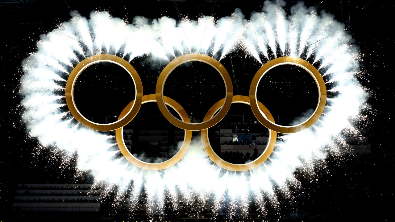 The Olympic rings come together as a fireworks display during the 2026 Winter Olympics opening ceremony in Milan-Cortina