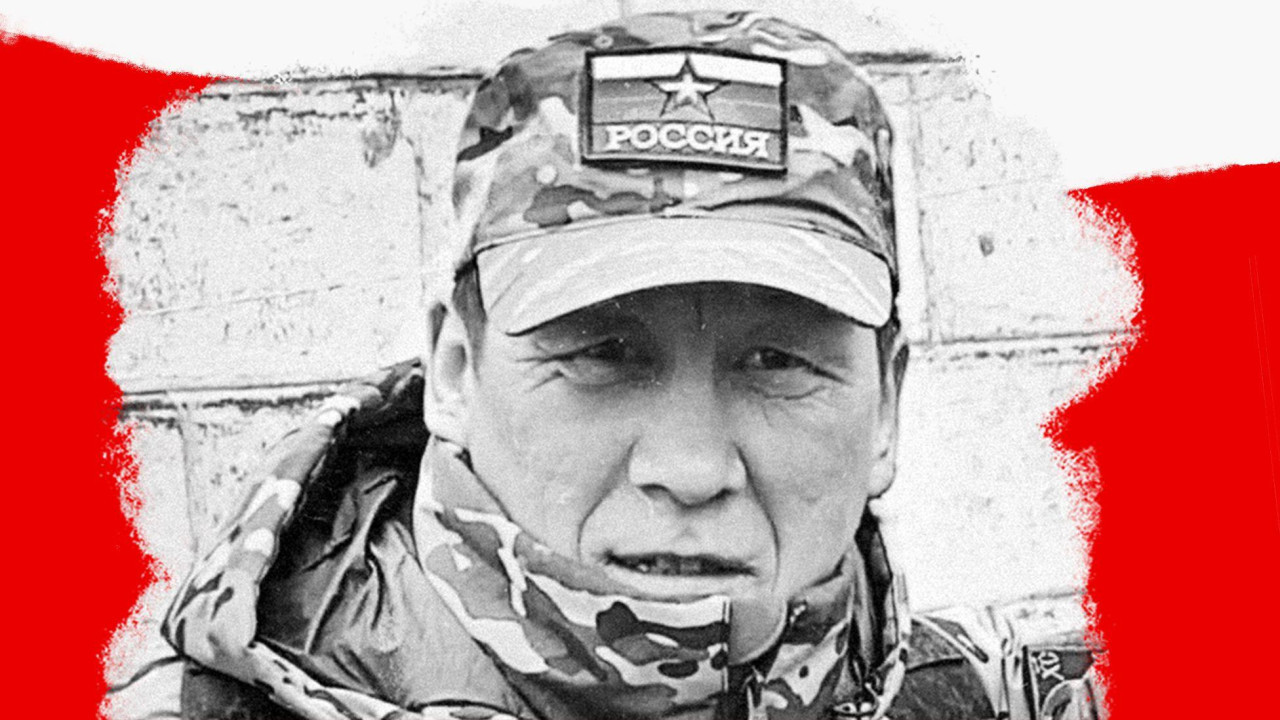 A composite image shows Vladimir Akeev in military fatigues and in the background is a cemetery with crosses and flowers