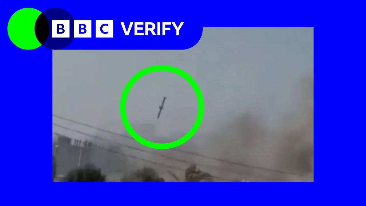 A BBC Verify-annotated still image where we have placed a green ring around the missile seen in the video