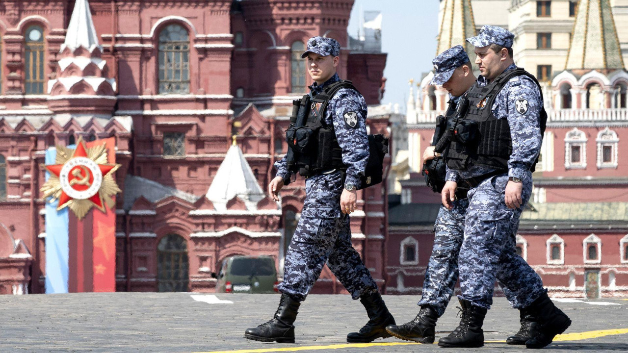  Russian National Guard officers walk across Red Square decorated for the Victory Day military parade in Moscow, Russia, on May 6, 2026.