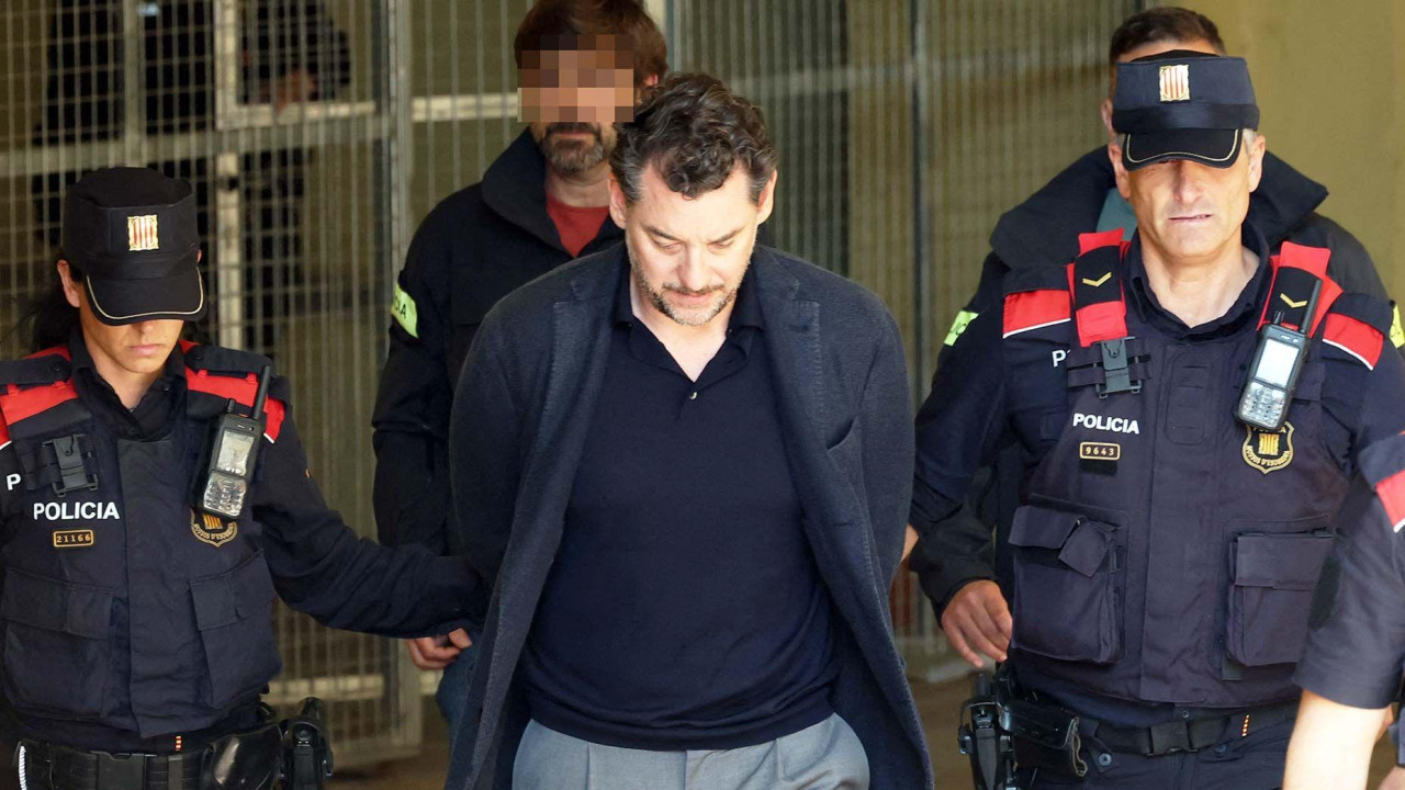 atalan regional police officers escort Jonathan Andic as he arrives at a court in Martorell, near Barcelona