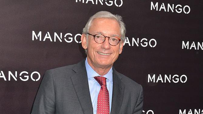 A 2011 pic of a Isak Andic, with grey hair and a red tie and suit