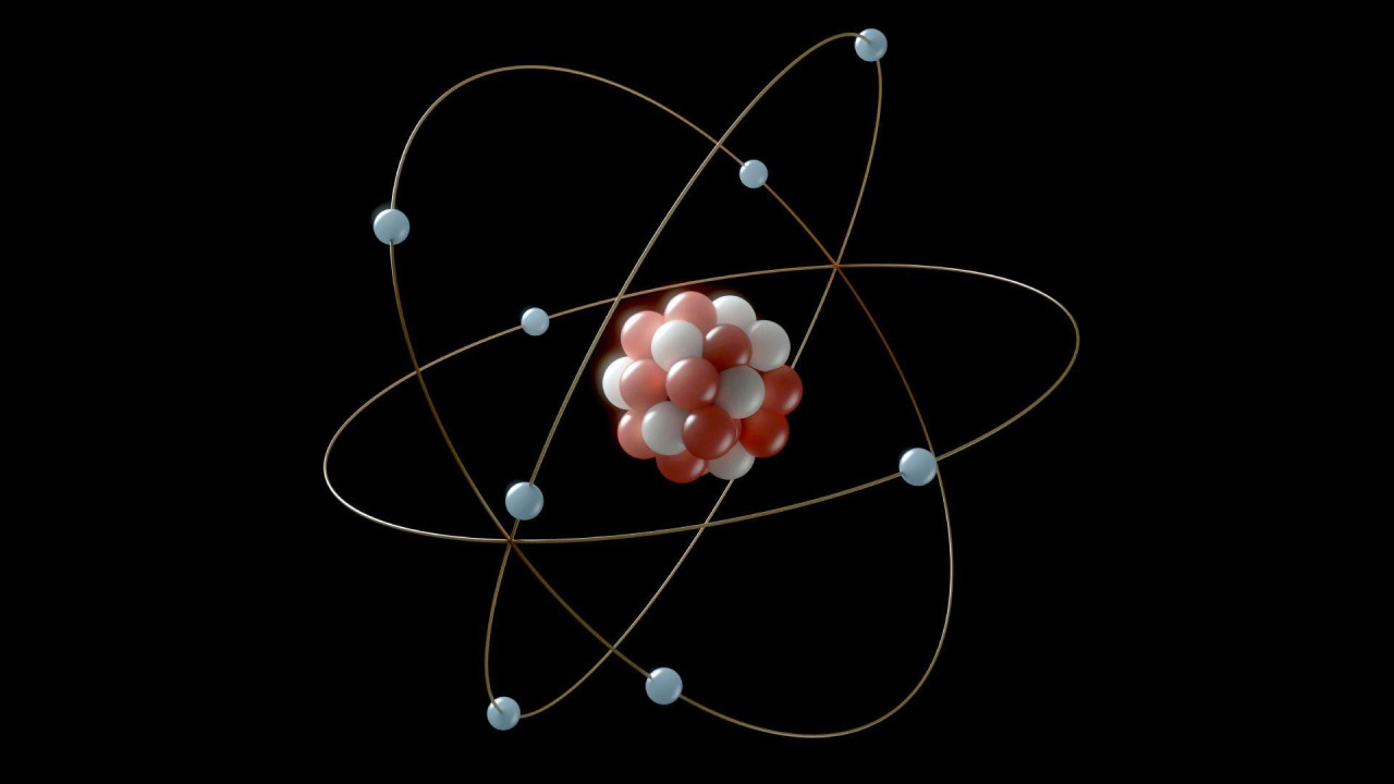 Ilustracija jezgra atoma sa protonima i neutronima oko kojih kruže elektroni prikazuje