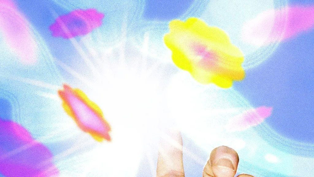 Leva ruka  je ispružena, kažiprst obasjava svetlost i okolo su žuti i rozi cvetovi