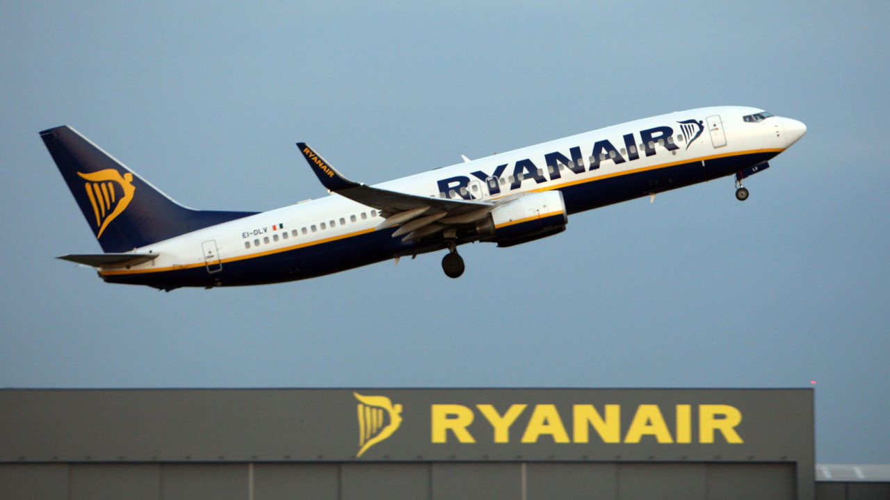 A Ryanair plane taking off from an airport 