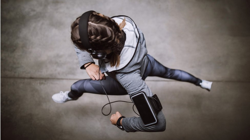 Shot from above of a woman running