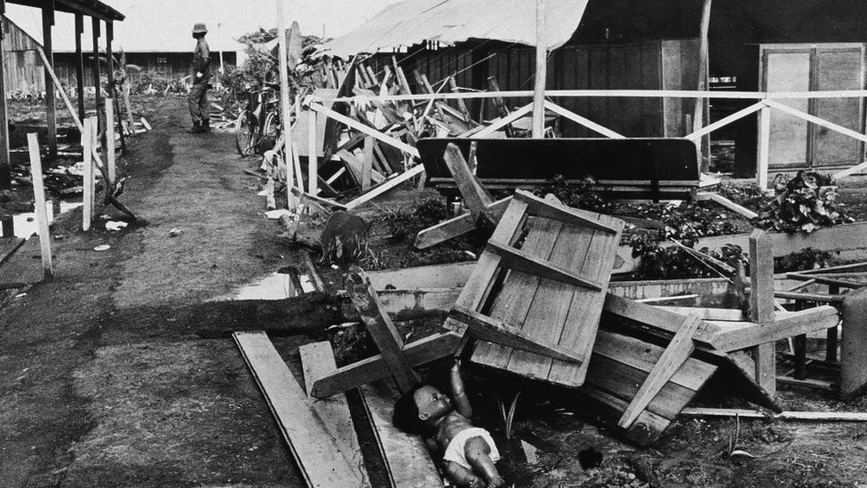 View of the partially collapsed main pavillion in the Jonestown compound, Guyana, November 1978