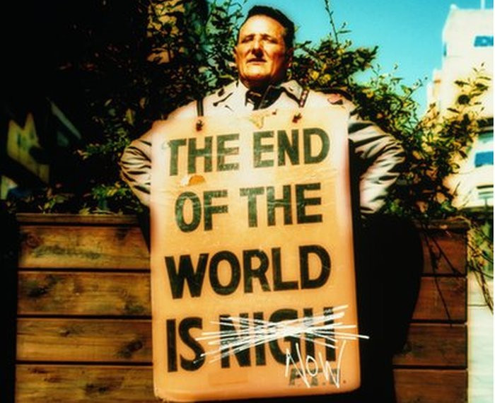 Man with 'the end of the world is nigh' placard
