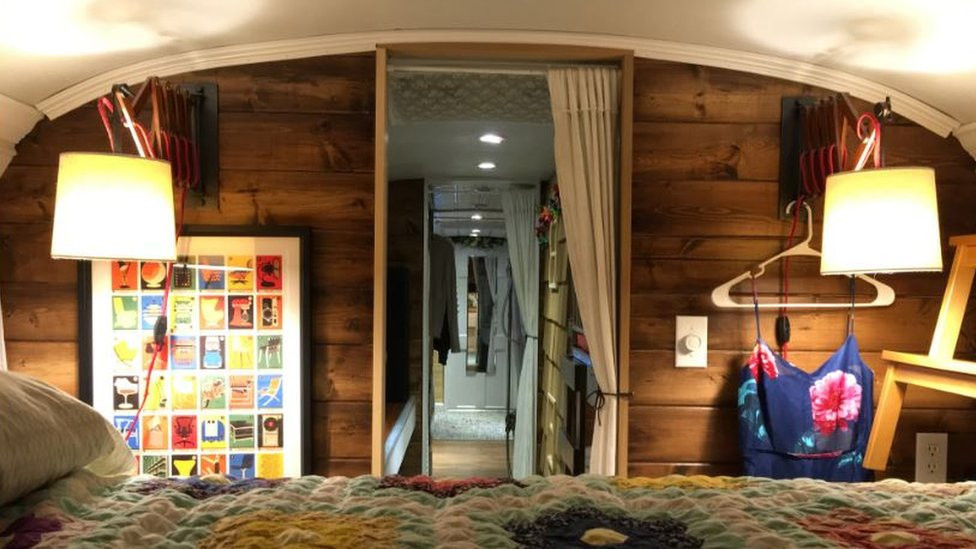 Master bedroom inside a school bus