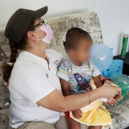 Wilder with a social worker in Mexico